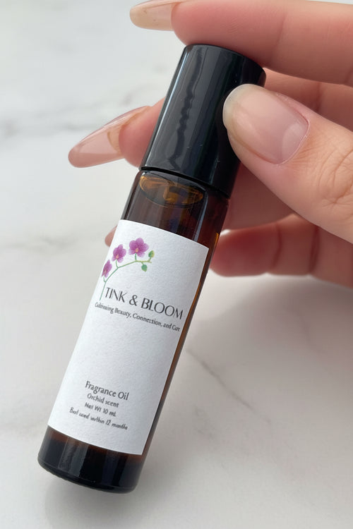 Orchid scent roller